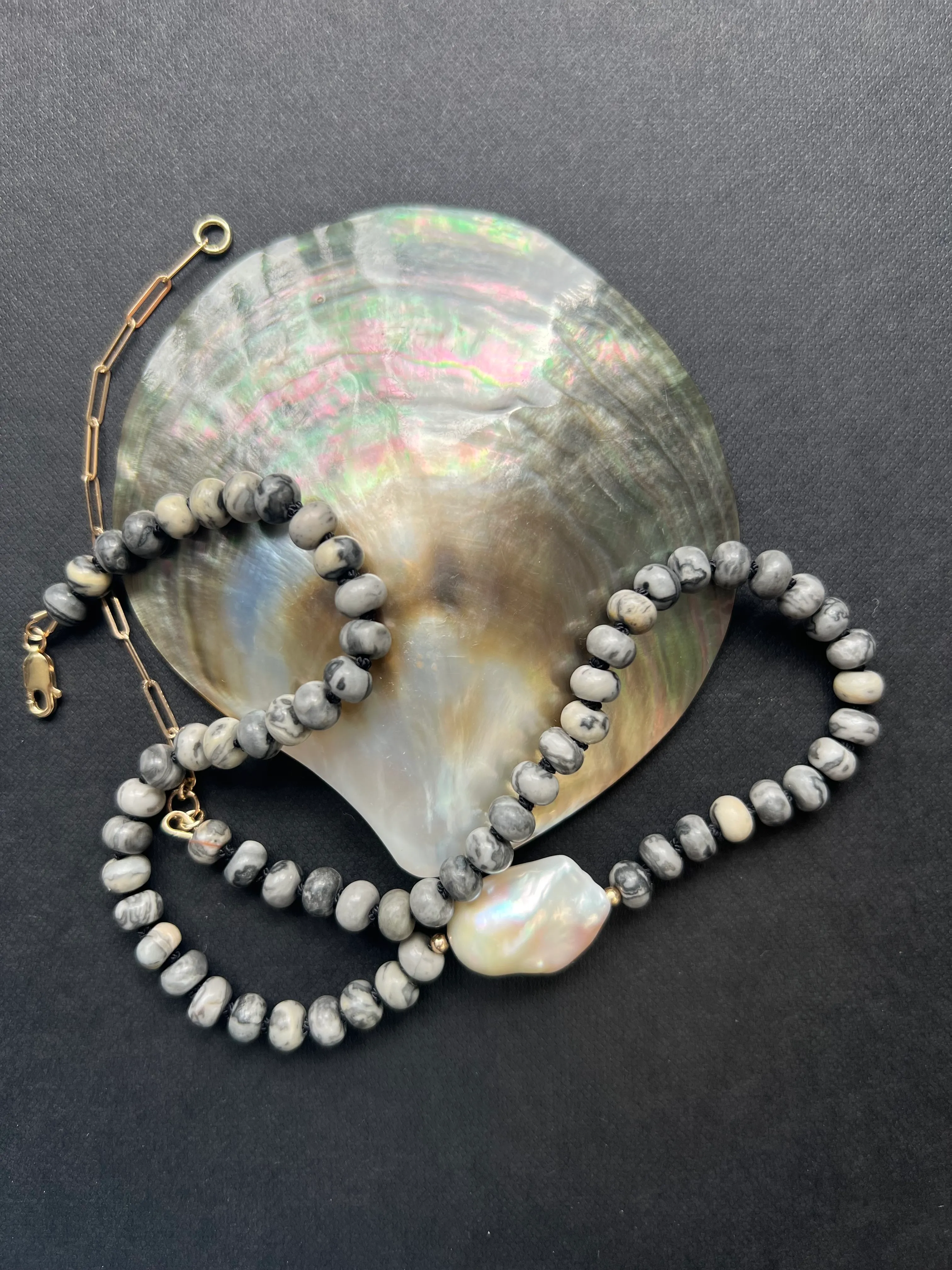 Grey lace agate beads strung with a single freshwater Baroque pearl and 9ct yellow gold adjustable clasp