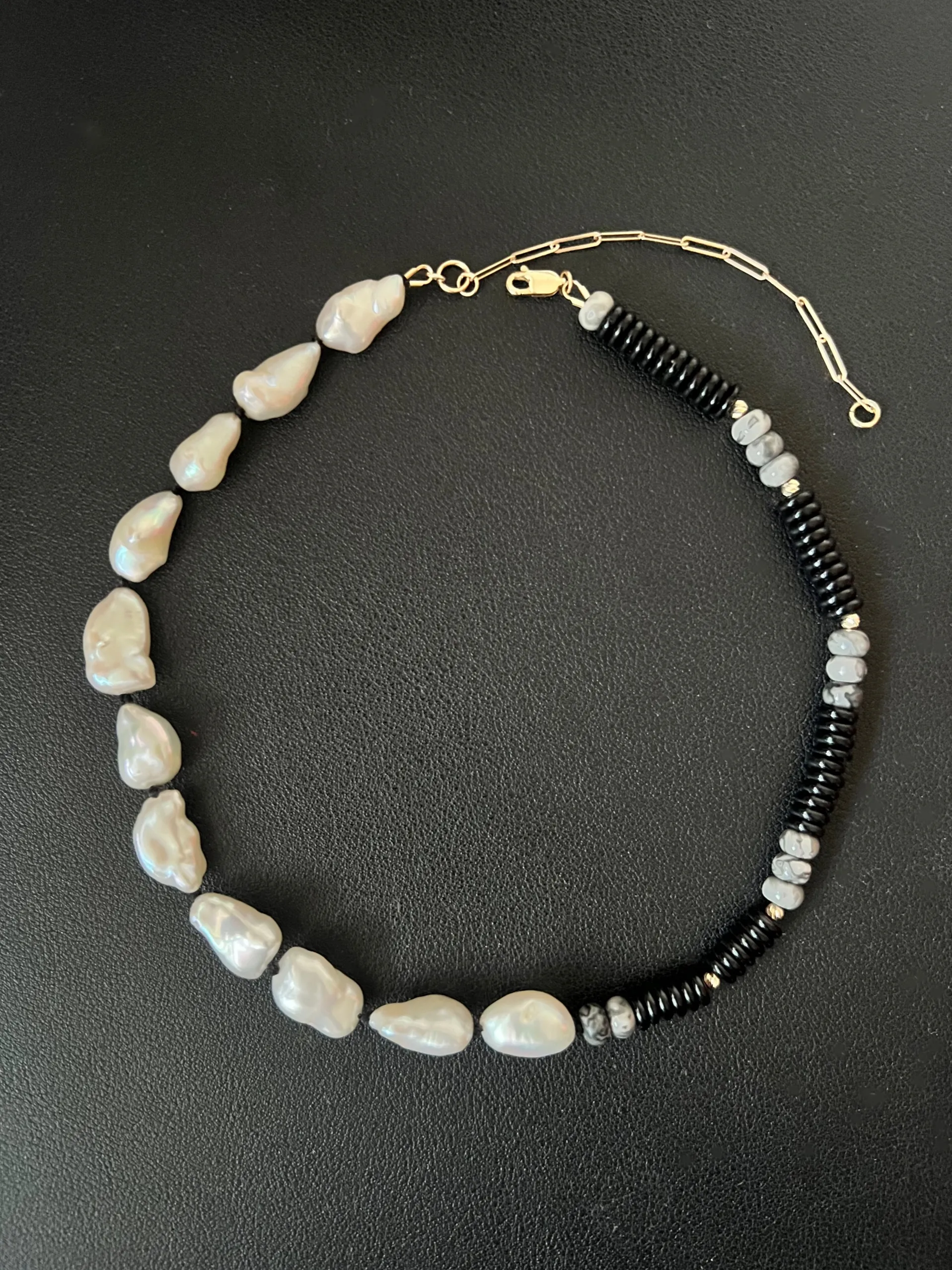 Freshwater Keshi pearls strung with black and crazy lace Agate beads and 9ct yellow gold faceted beads and adjustable clasp